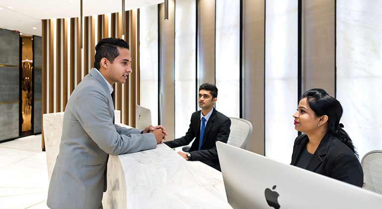 Serviced Office Receptionist Greeting Client